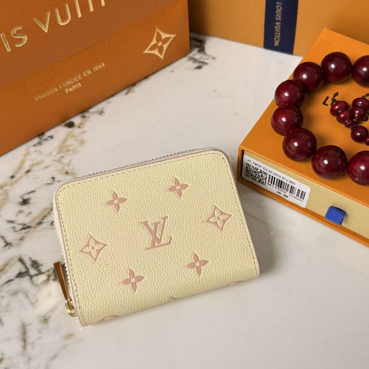 Cléa Wallet Monogram Empreinte Leather