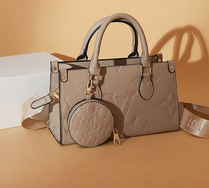 OnTheGo East West Monogram Handbag