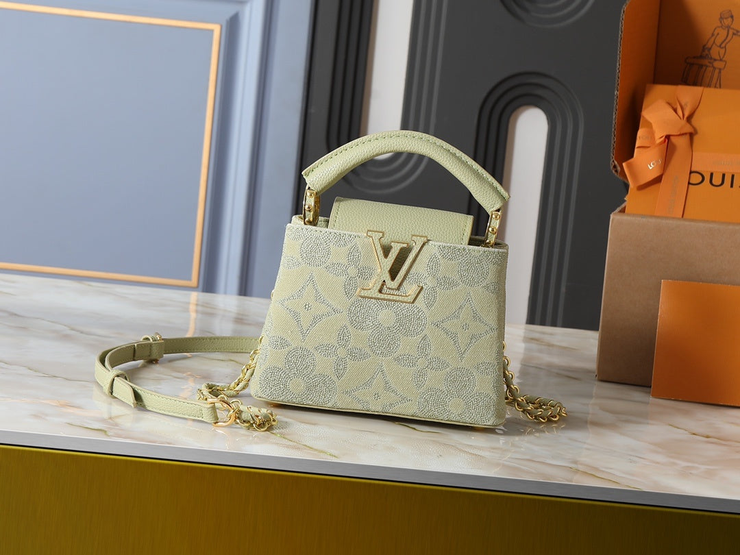 Capucines Handbag