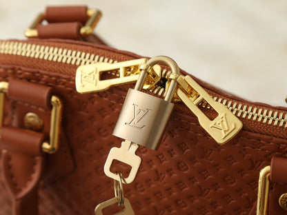 Alma Monogram Empreinte Leather Bag