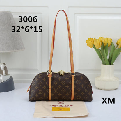 Elegant Dome Shoulder Bag – Monogram Embossed