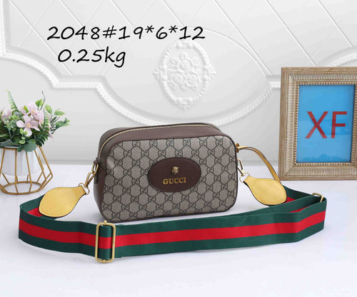 Mini camera crossbody bag