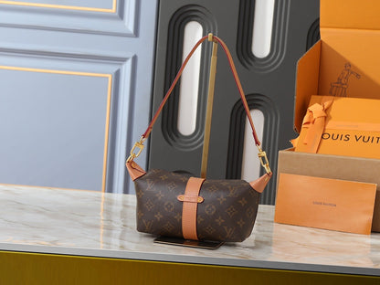 Pochette Mia Monogram Handbag