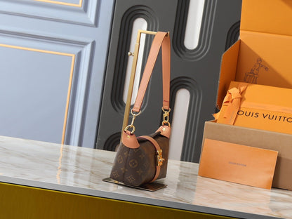 Pochette Mia Monogram Handbag