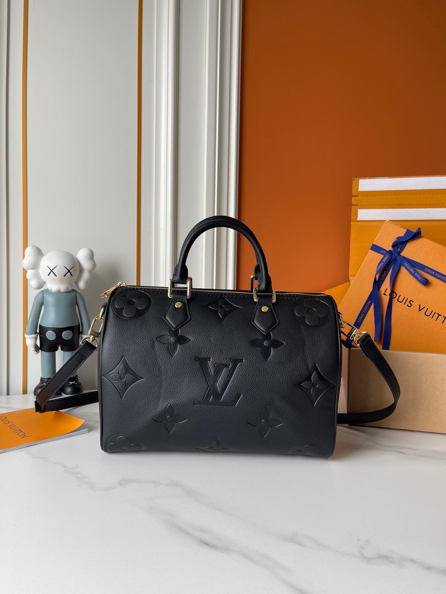 Embossed Monogram Boston Bag