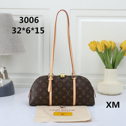 Elegant Dome Shoulder Bag – Monogram Embossed