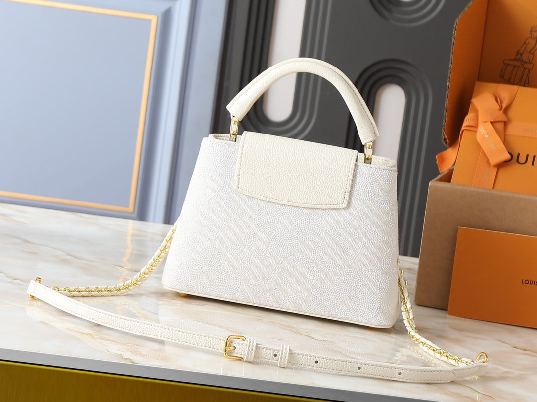 Capucines Handbag
