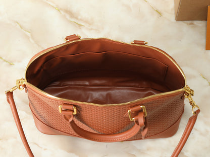 Alma Monogram Empreinte Leather Bag