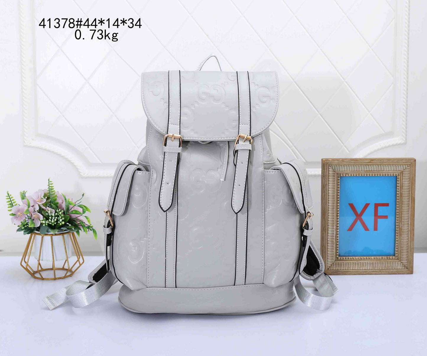 Embossed Multi-Pocket Backpack