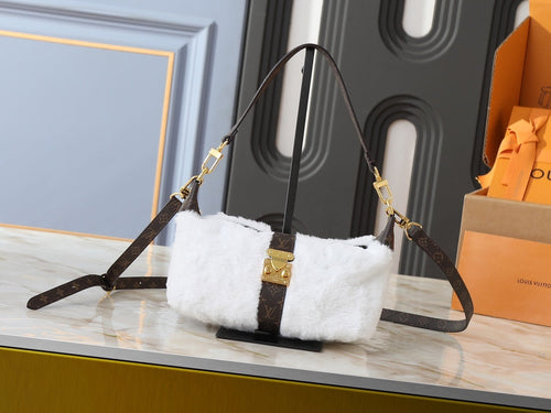 Pochette Mia Monogram Handbag