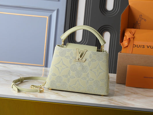 Capucines Handbag