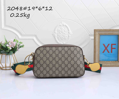 Mini camera crossbody bag